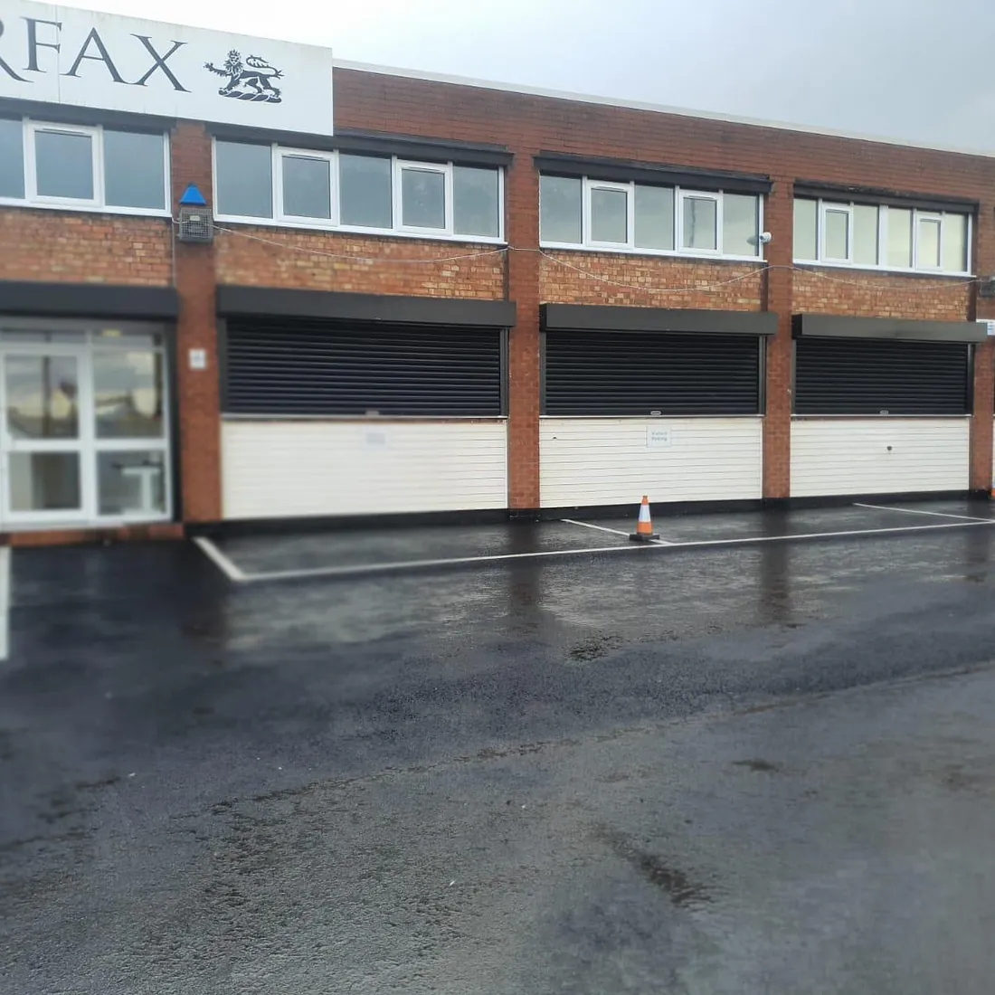 Roller shutter installation in Walsall. Powder coated black.