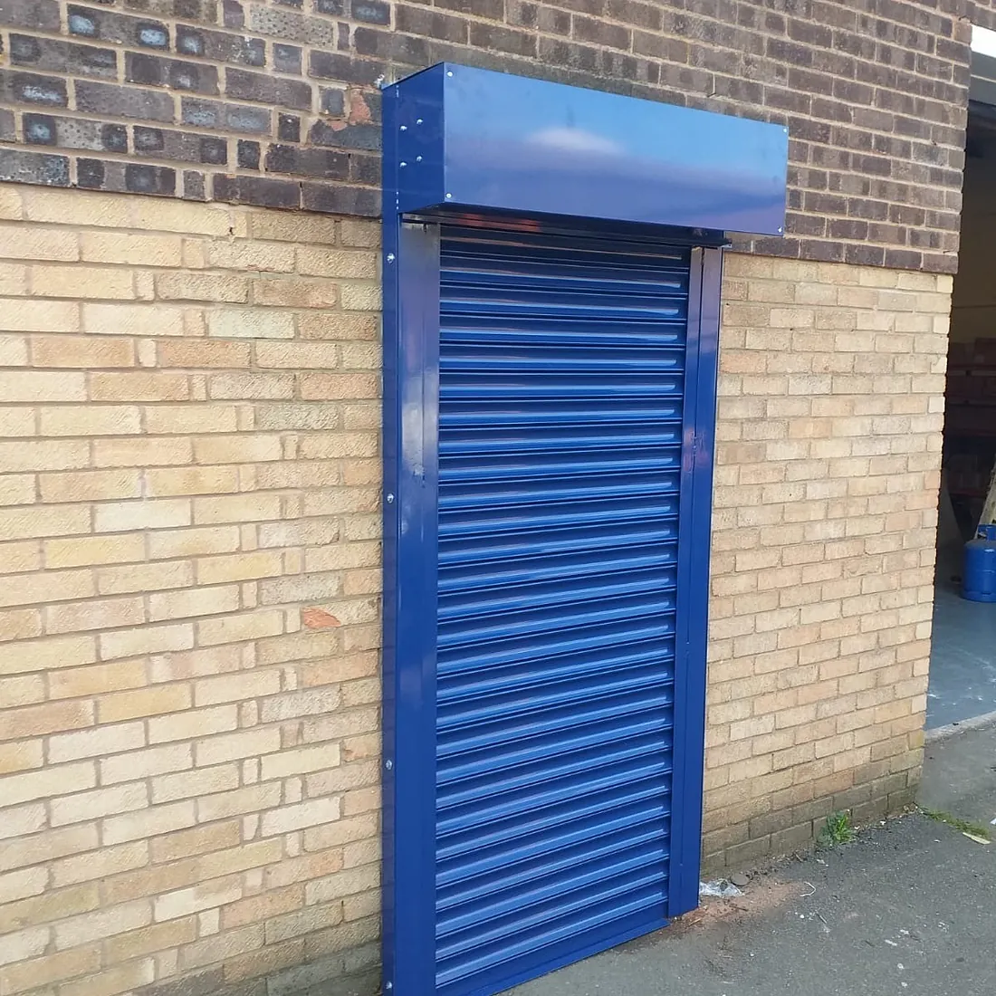 Blue single door roller shutter