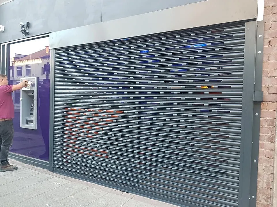 Perforated lath - shop roller shutter