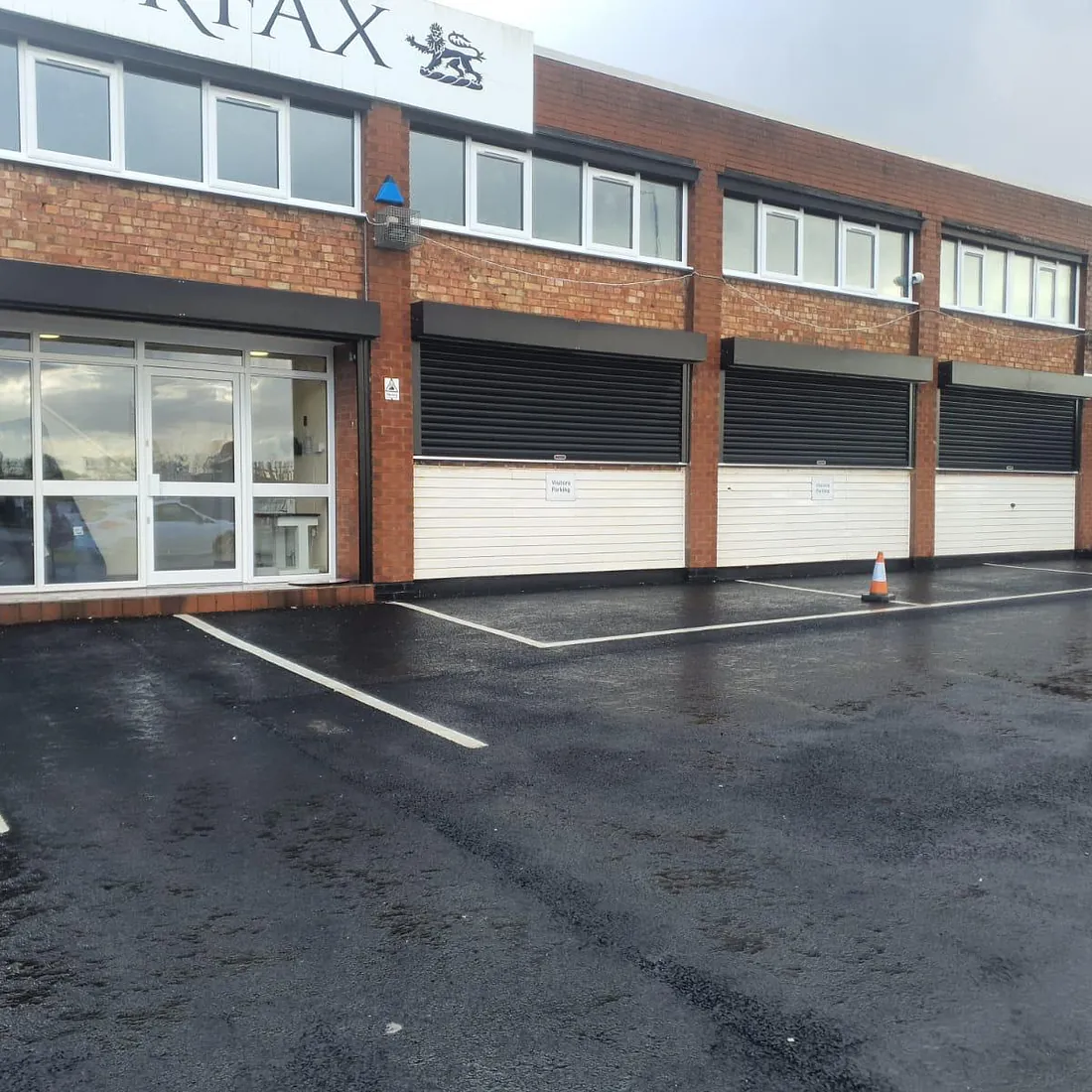 Roller shutter installation in Walsall. Powder coated black.