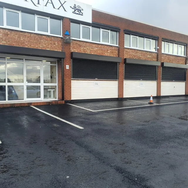 Roller shutter installation in Walsall. Powder coated black.