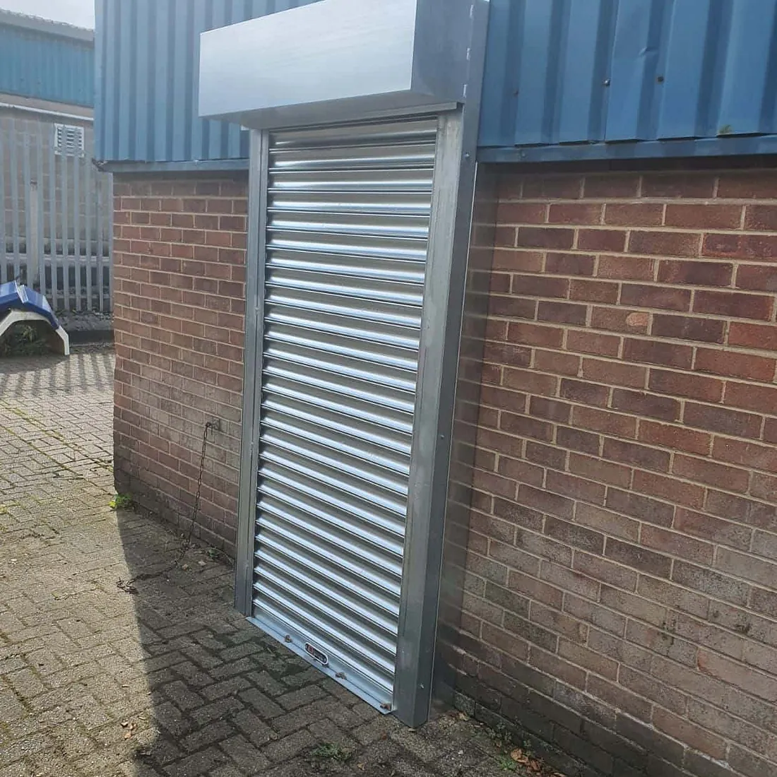 Galvanised electric roller shutters