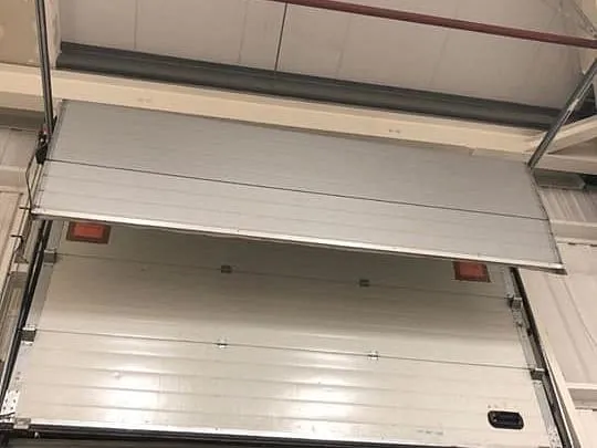 Repairing a sectional door