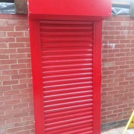Red single door roller shutter