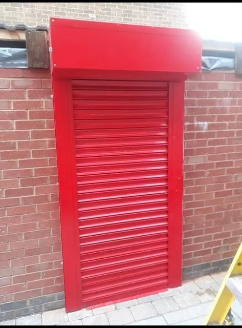 Red single door roller shutter