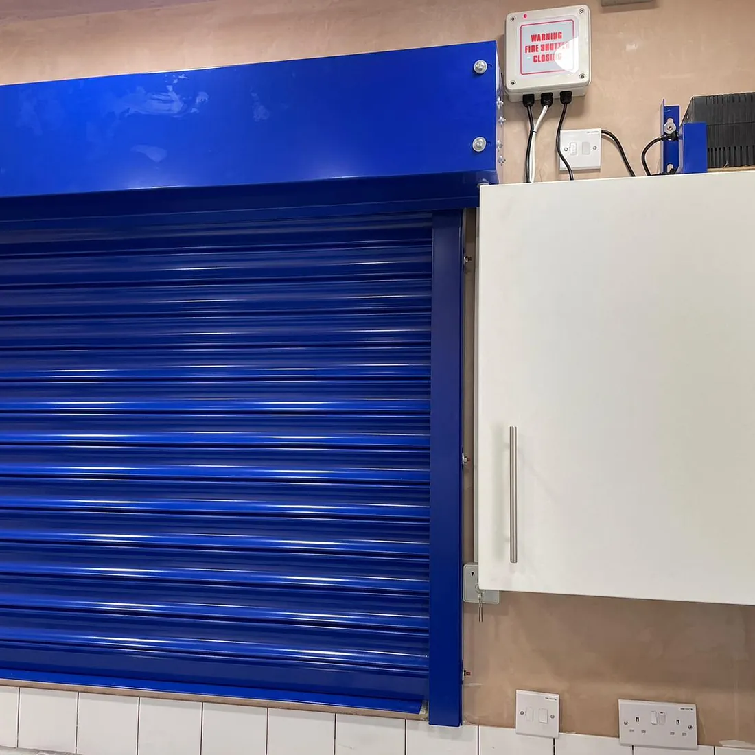 blue window roller shutter